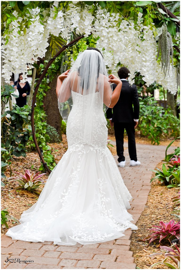 Tropical yet classic, Janice and Michael's Living Sculpture Sanctuary wedding in Davie was the perfect mix of romantic, hilarious, fun, sweet, and chic! After having met at a restaurant, his persistence, and a romantic proposal at the Flamingo gardens, they are now ready to tie the knot!